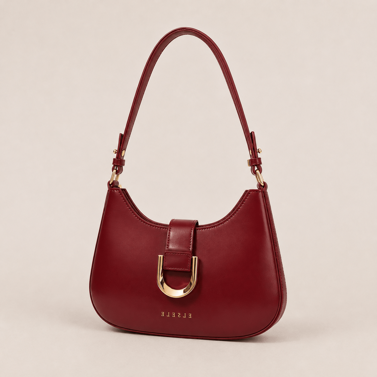 ELSELE Bordeaux Handtasche – Dreiviertelansicht Bordeauxrote Damen-Handtasche von ELSELE in leichter Dreiviertelansicht