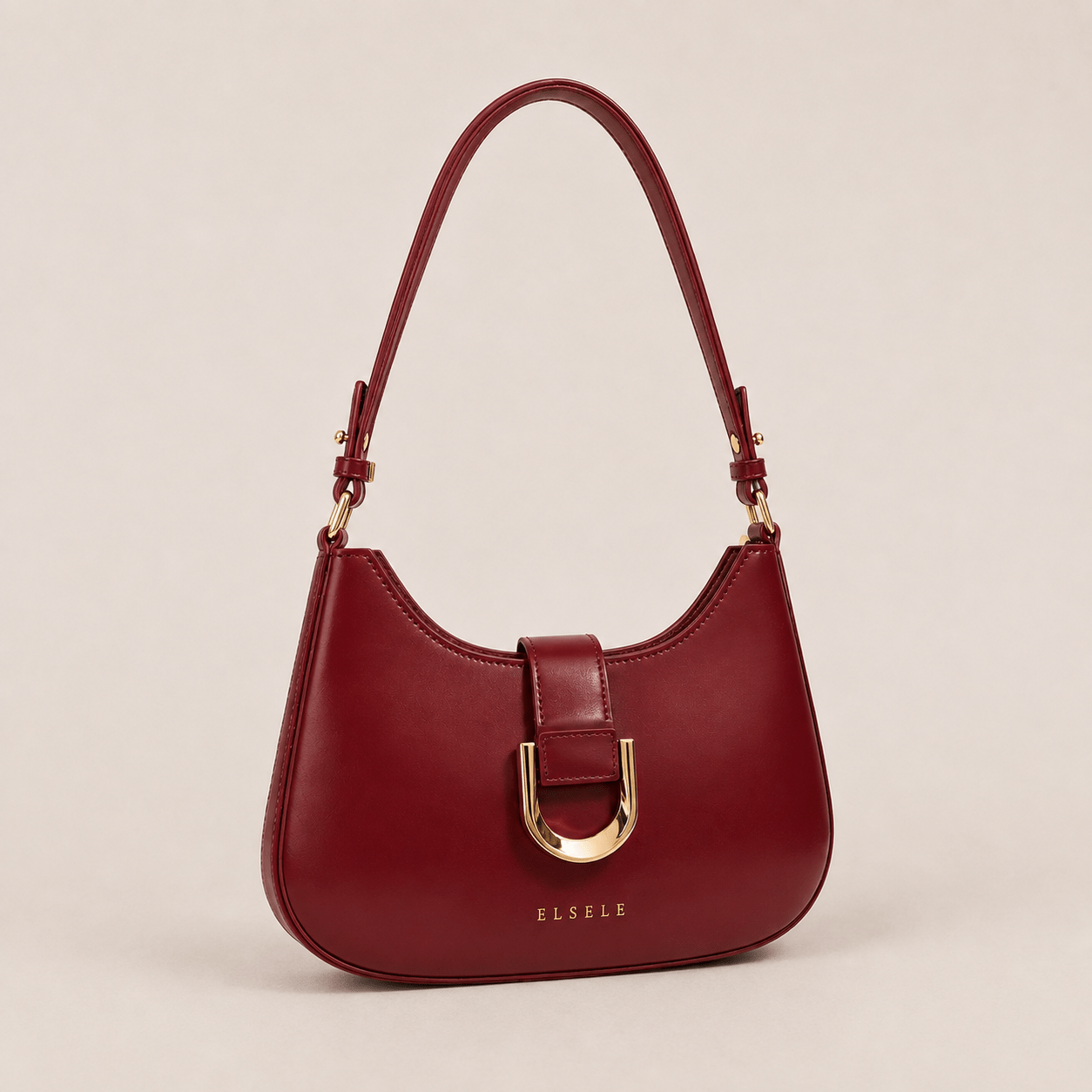 ELSELE Bordeaux Schultertasche – Produktansicht Elegante bordeauxrote ELSELE Schultertasche mit goldfarbenen Details