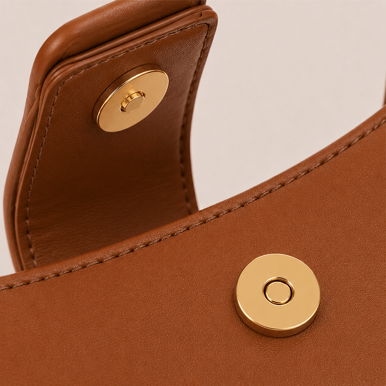 Magnetic closure detail of the Lunara Brown Leather Shoulder Bag