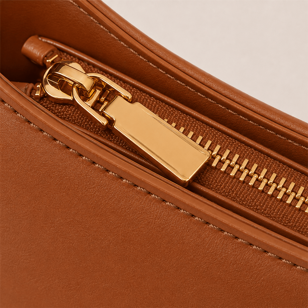 Zipper detail of the Lunara Brown Leather Shoulder Bag