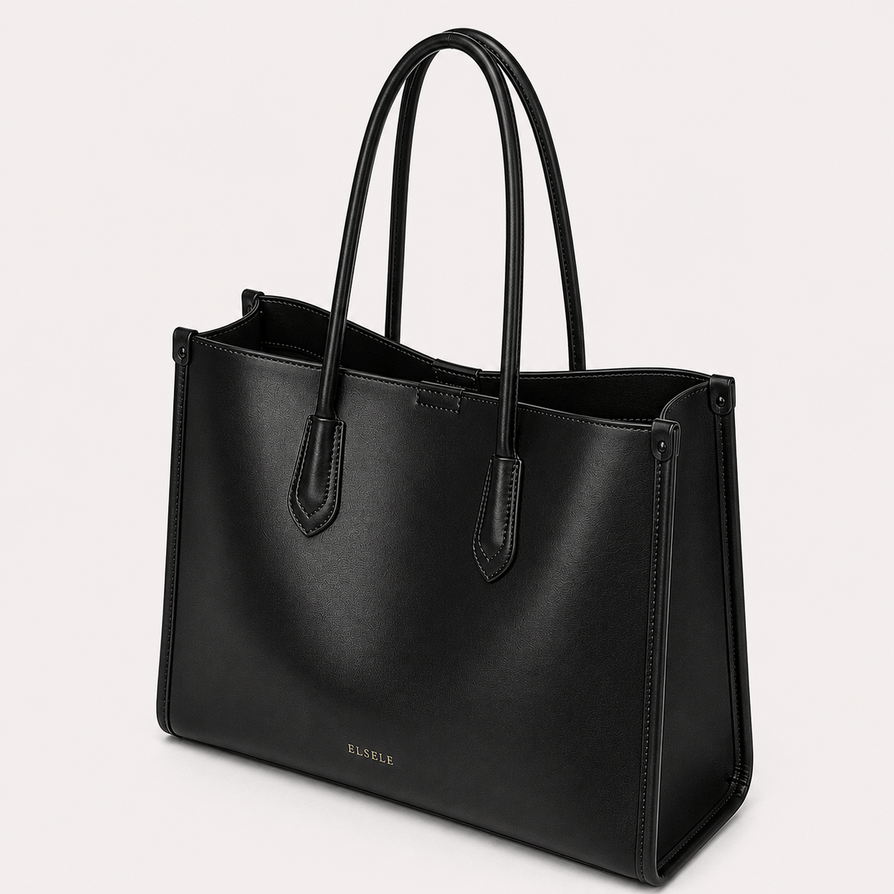 Angled view of the Aveline Black Leather Tote Bag