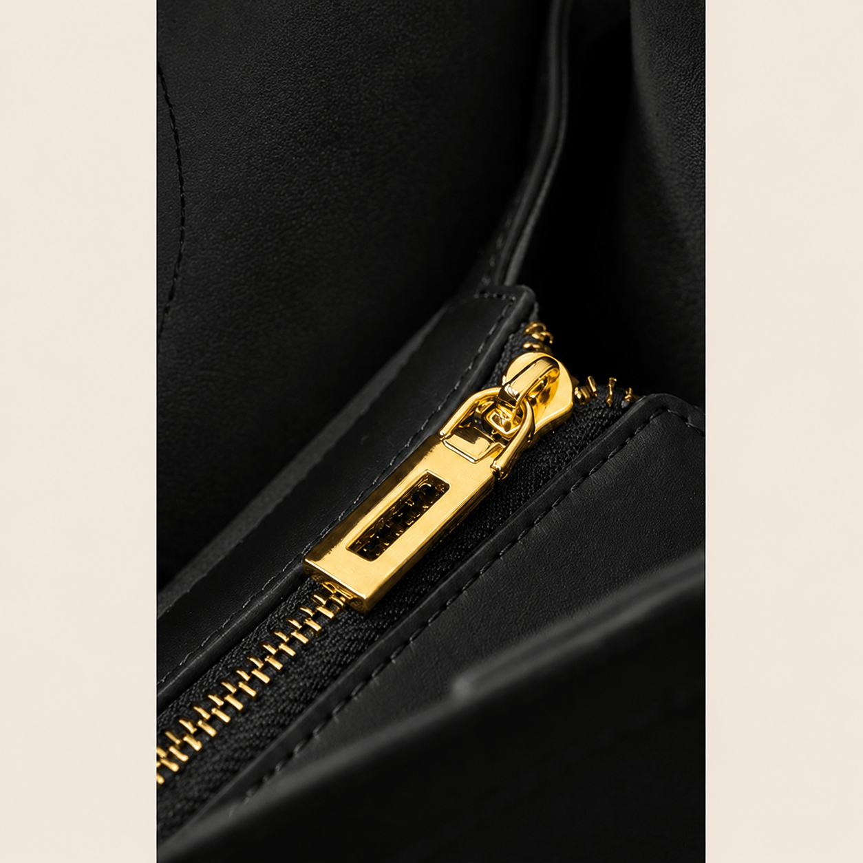 Gold-tone hardware detail on the Aveline Black Leather Tote Bag